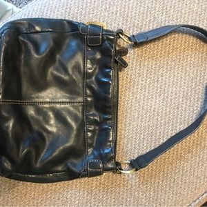 Wilson leather purse. Used condition with minor wear.